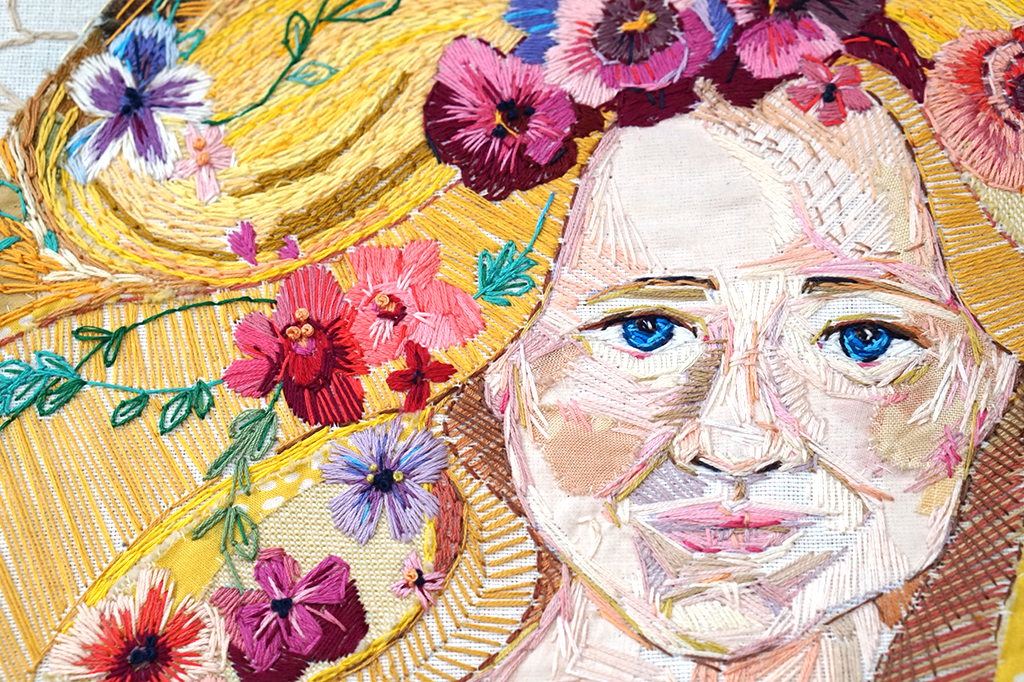 Flowers in a girls hair by Marna Lunt