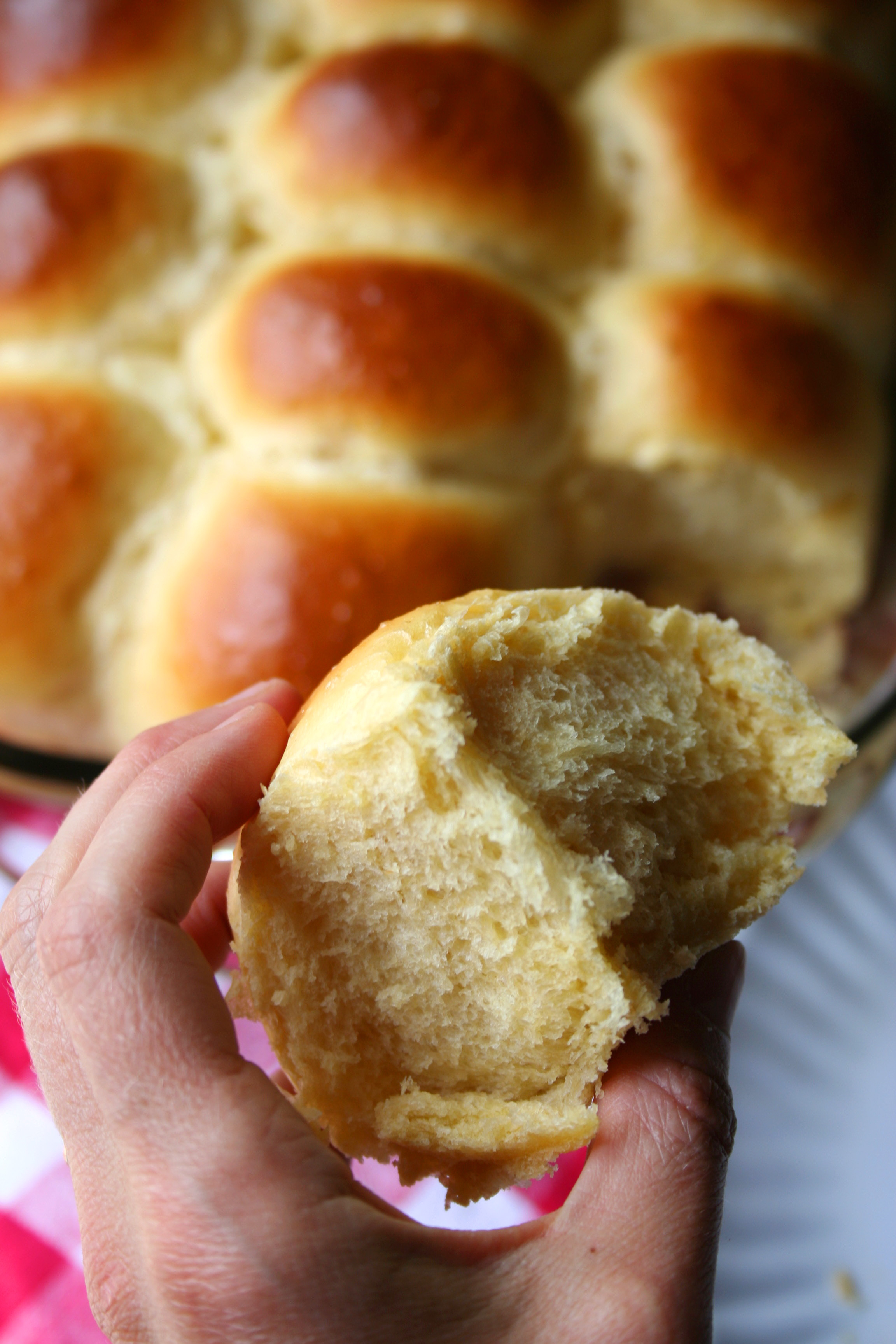 Hawaiian bread roll with bite taken out