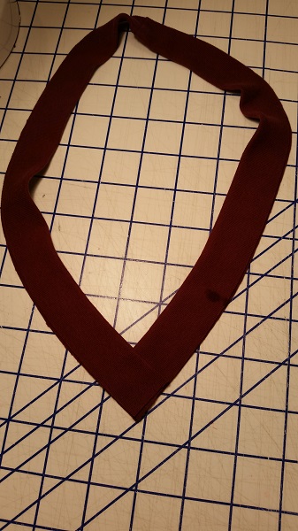 align neckband ends to form V