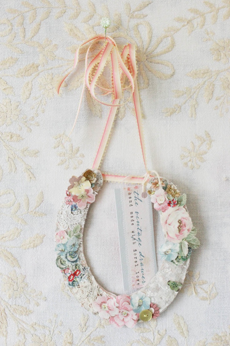 A beautifyl hand stitched floral wedding horse shoe made by Vicky Trainor.