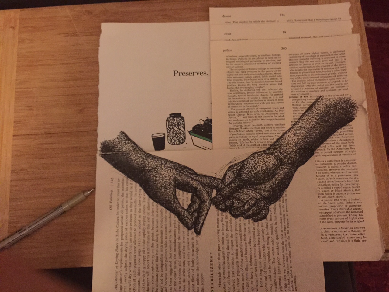 Hands drawn on book pages