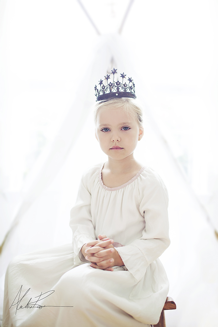 Photo of Girl in White Color Scheme with Black Accents