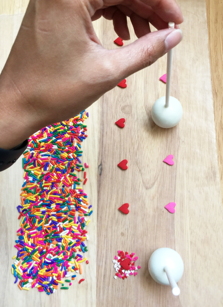 Place pop on an individual jumbo sprinkle