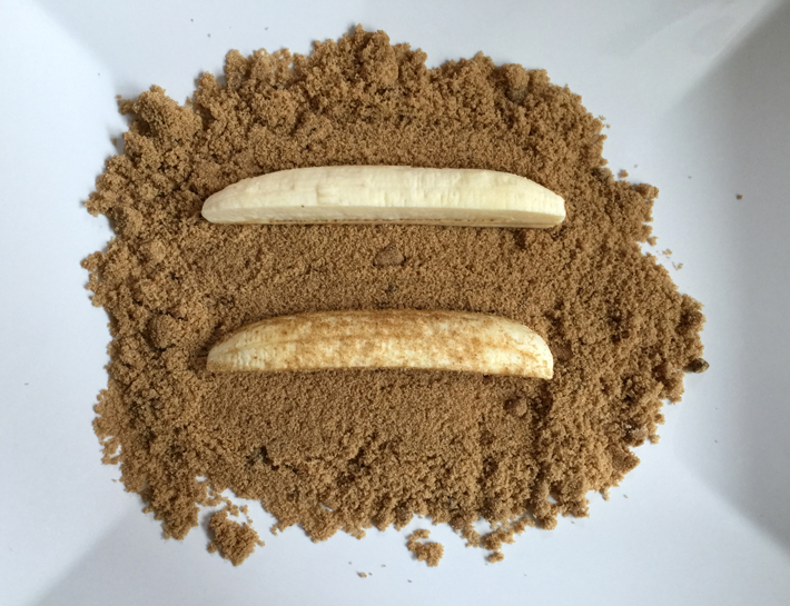 Roll a couple of banana slices in brown sugar