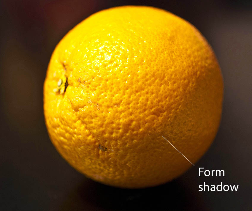 Orange under the directional light showing the form shadow.