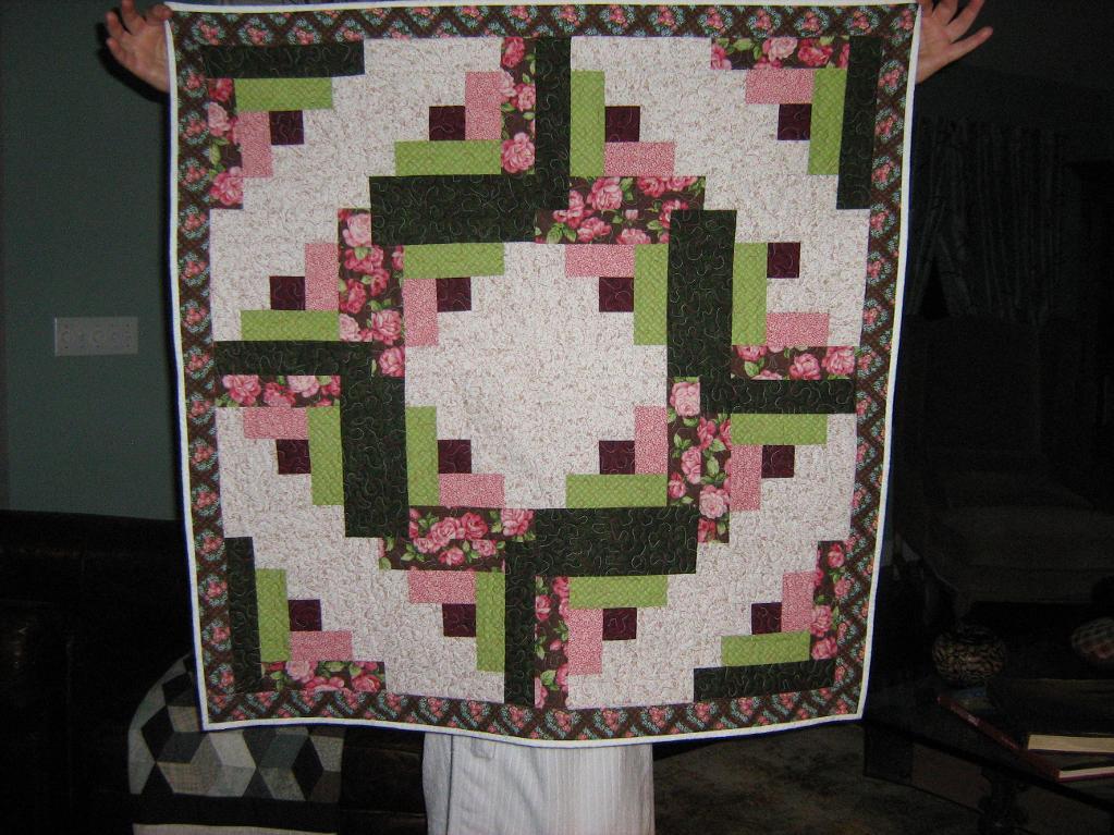 pieced rose quilt