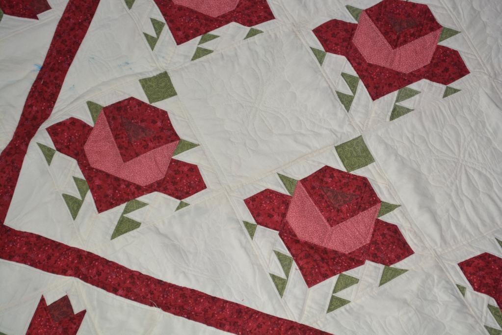 pieced rose quilt