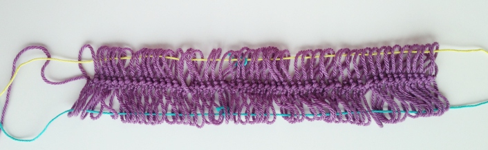 A raw finished piece of hairpin lace