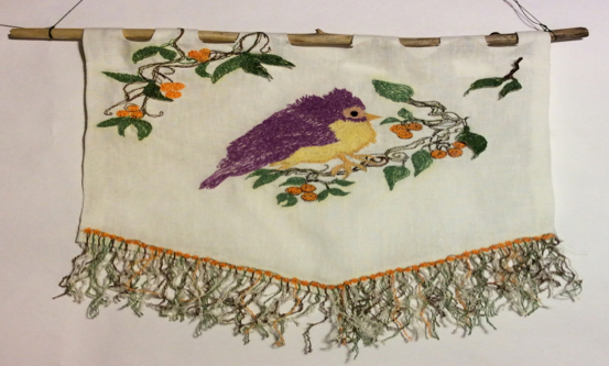 Embroidered bird wall hanging