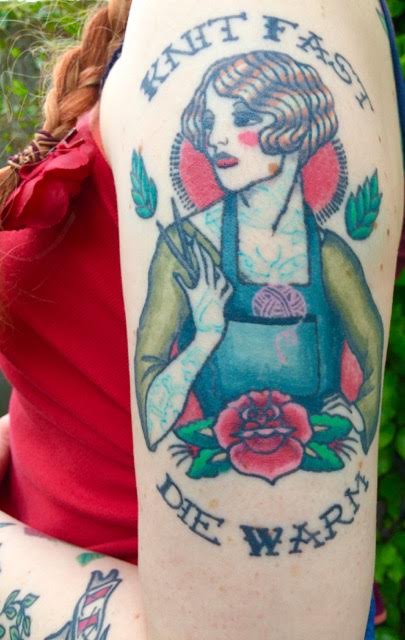 Tattoo of a woman holding knitting needles