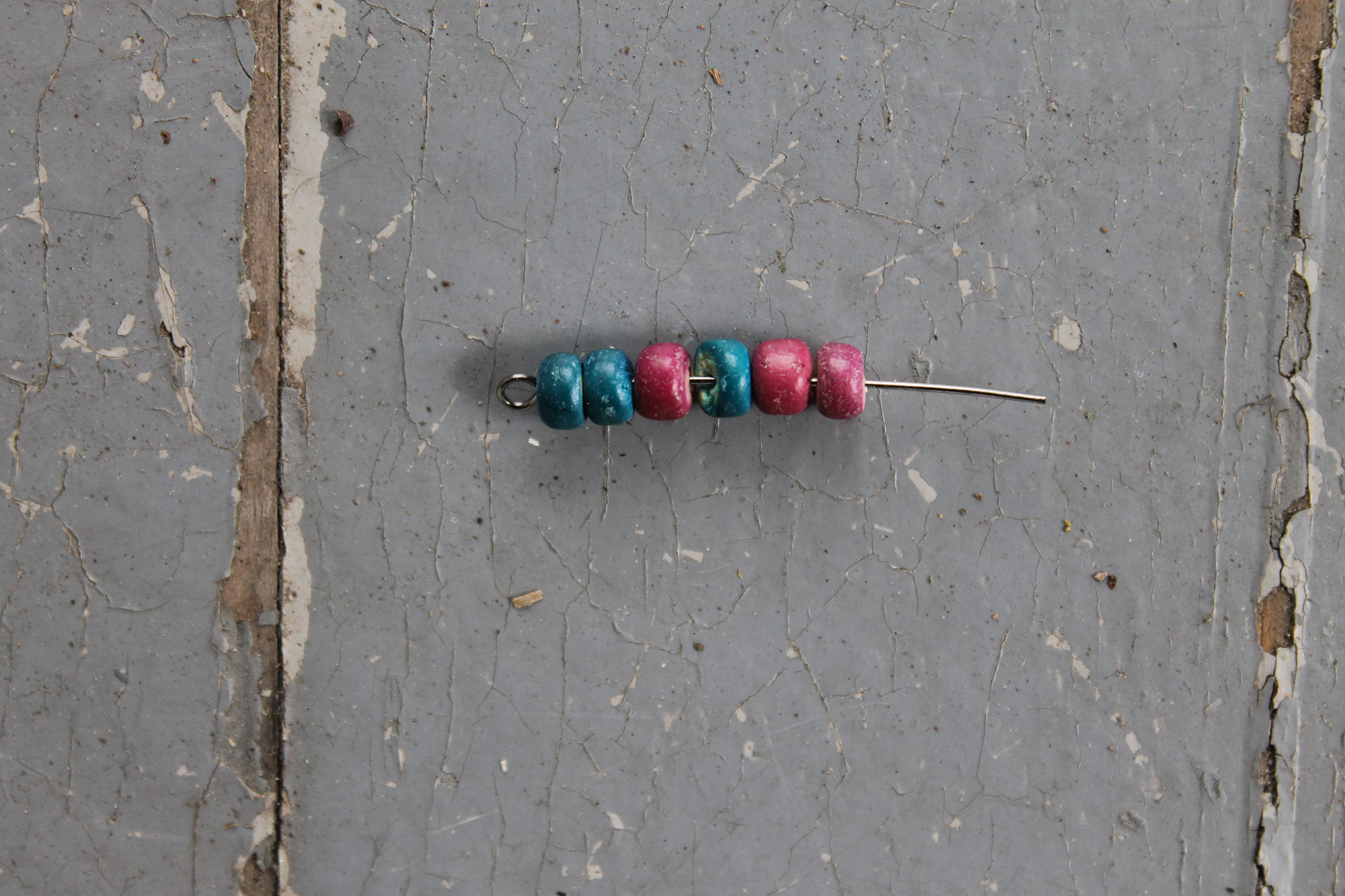 Beading an eye pin