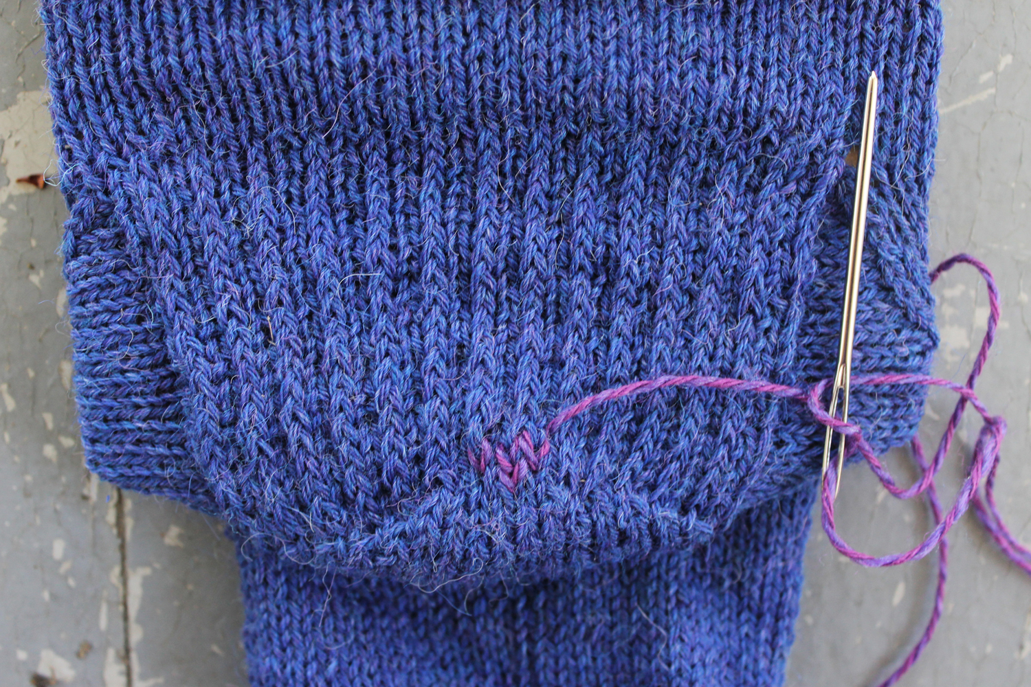 Duplicate stitch rows on a sock heel