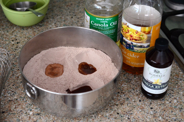 Making wells in one-bowl chocolate cake mixture