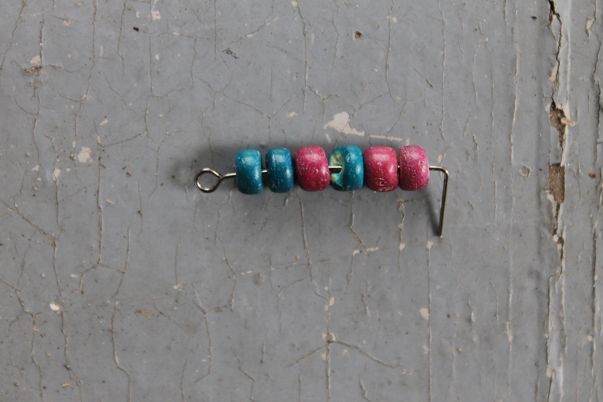 Eye pin with angled edge