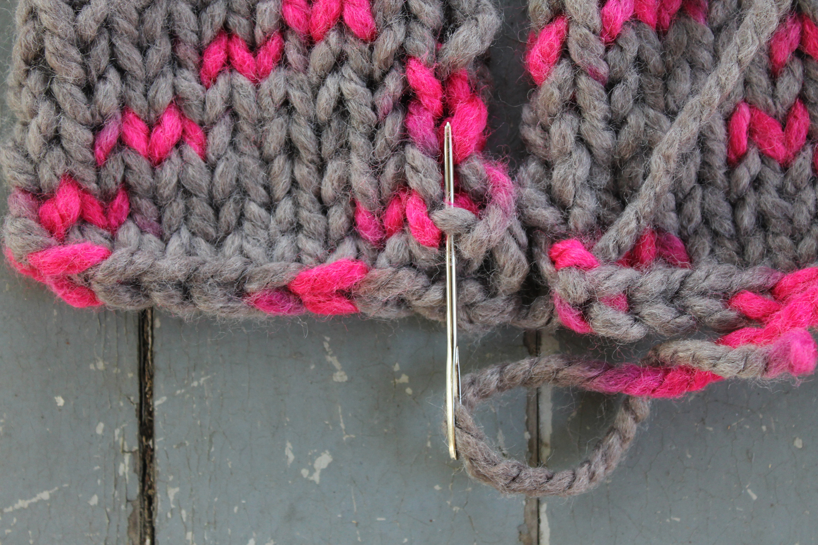 Inserting the yarn needle into the first ladder stitch