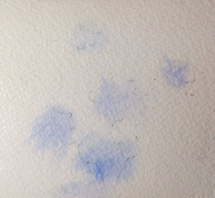 painting blue sky patches in a cloud