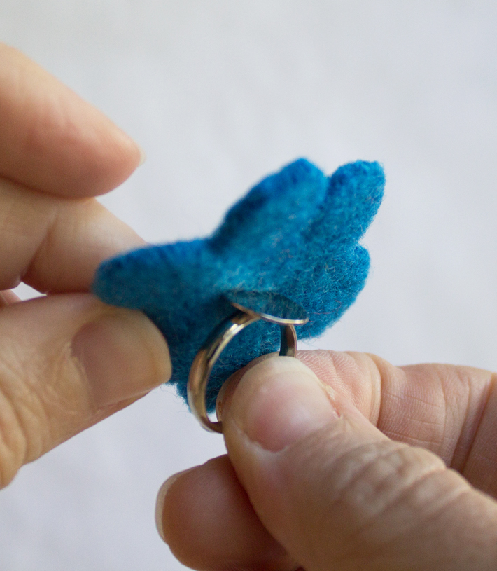 insert ring into wool flower