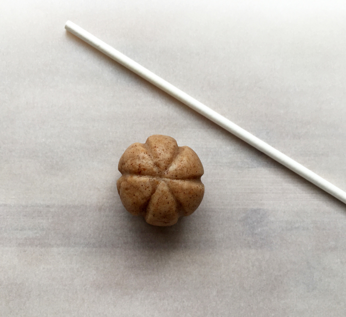 Cake pop dough shaped like a pumpkin