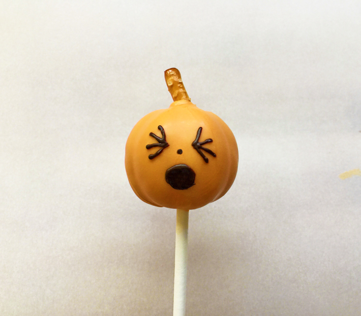 Wacky jack-o'-lantern cake pops