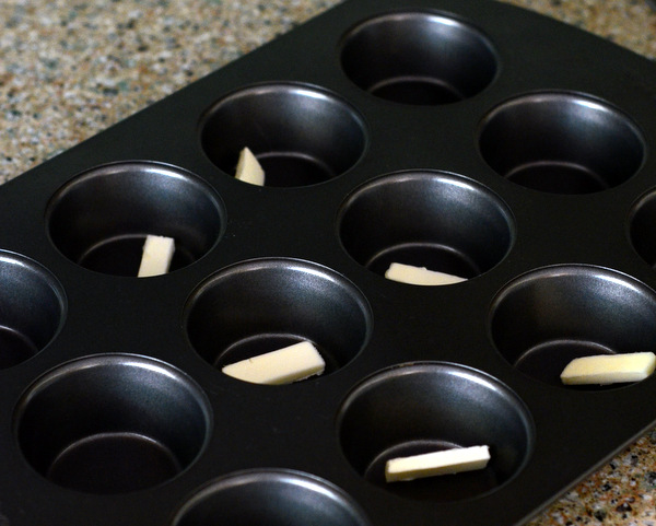 Muffin Pan with Butter in Cavities