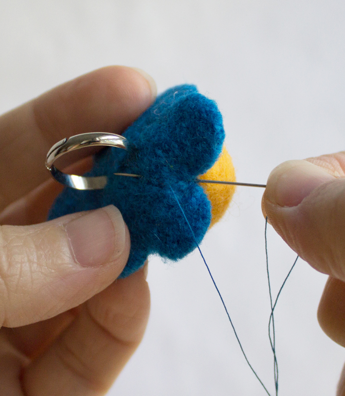 sew the ball to the wool flower