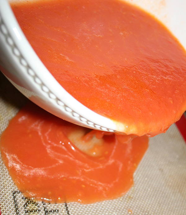 Pouring the paste on a sheet