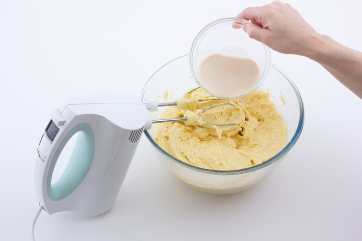 Add milk to cupcake batter