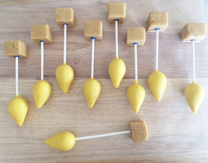 Adding bases to menorah cake pops
