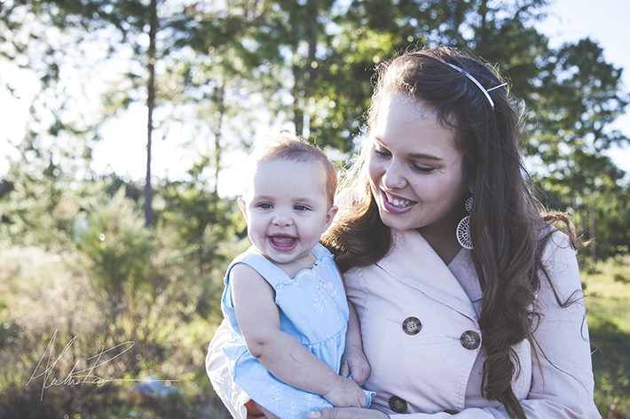 baby sister smiles