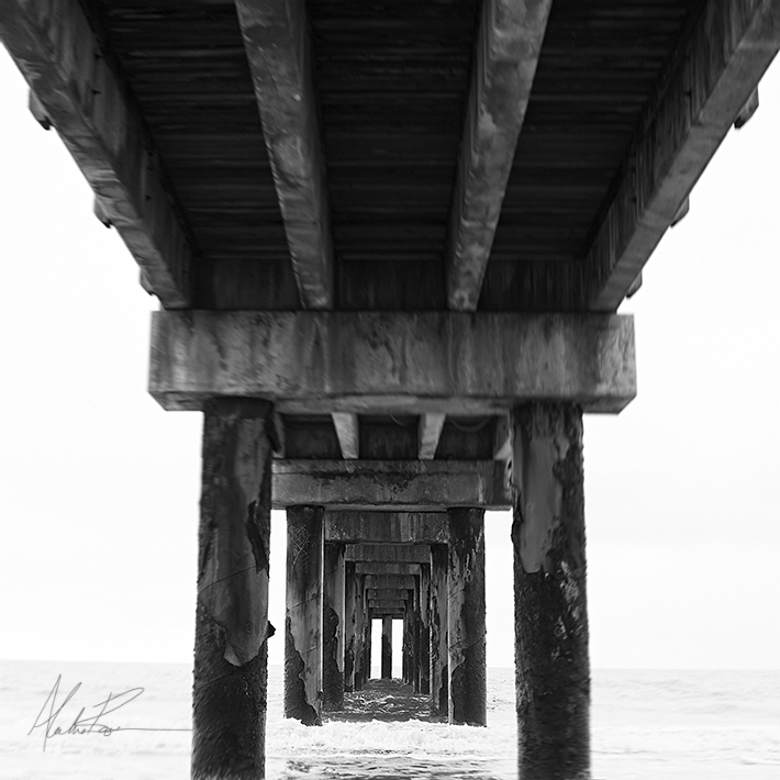 beach pier black and white