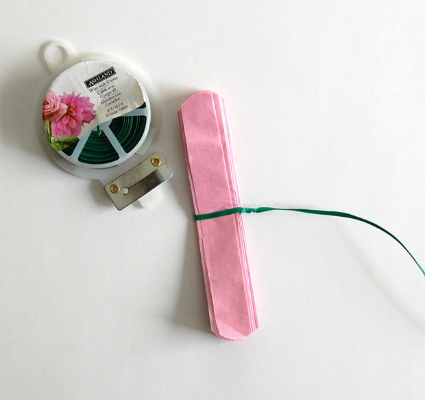 Adhere floral wire to center