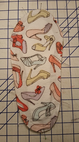 fabric sole stitched to foam core