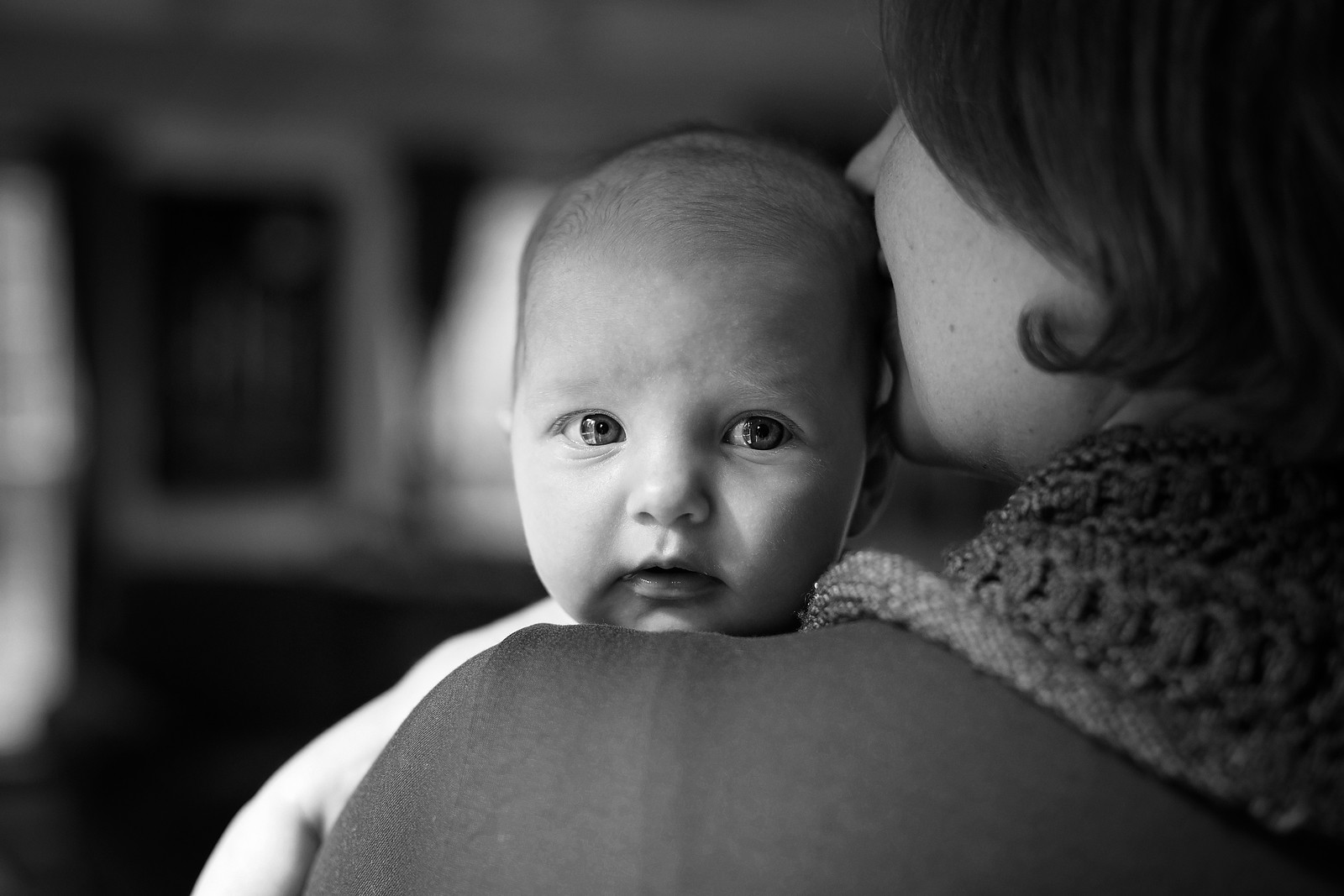 Baby Looking Over Mom's Shoulder