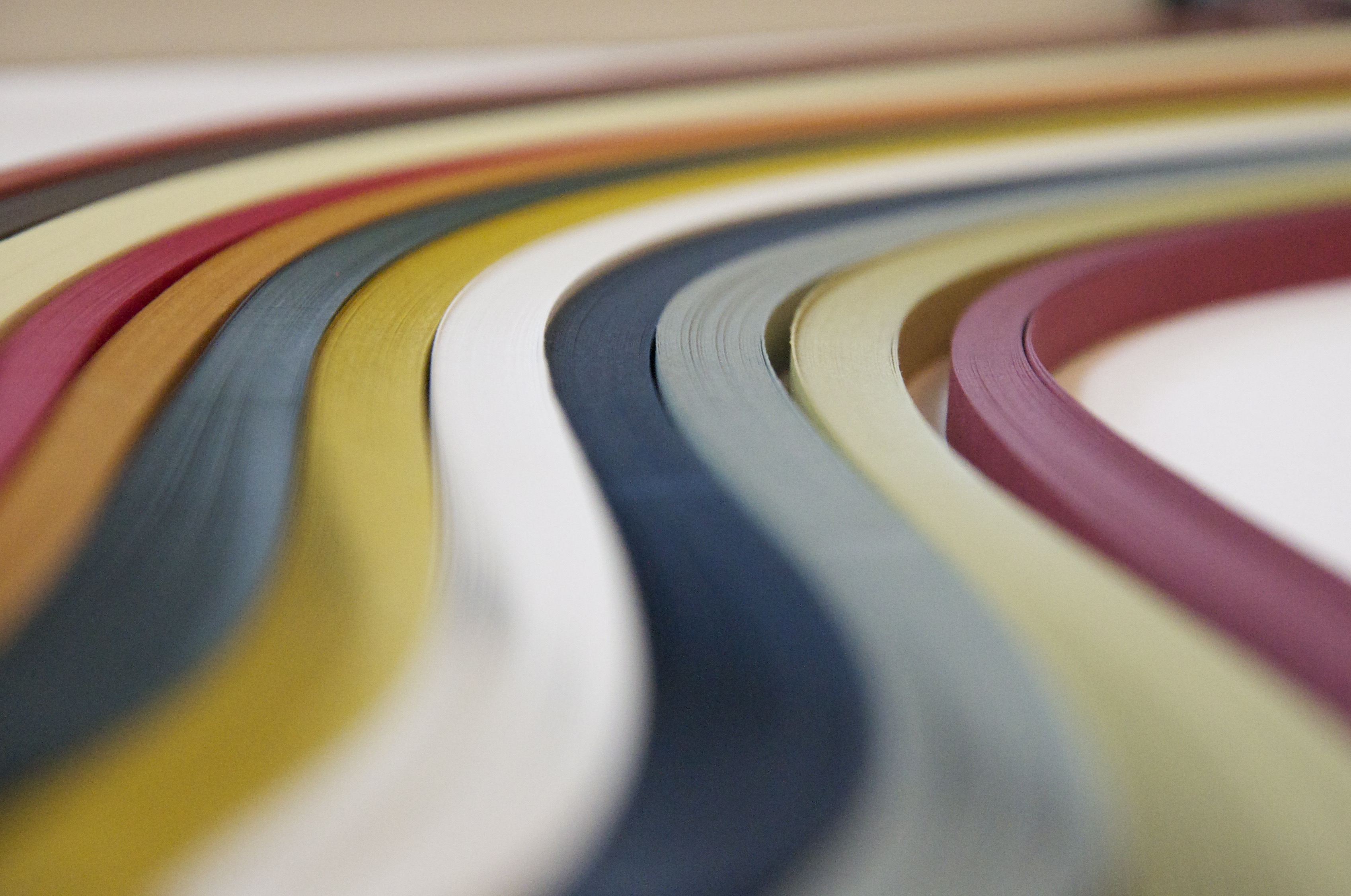 Image of multiple colored quilling paper strips