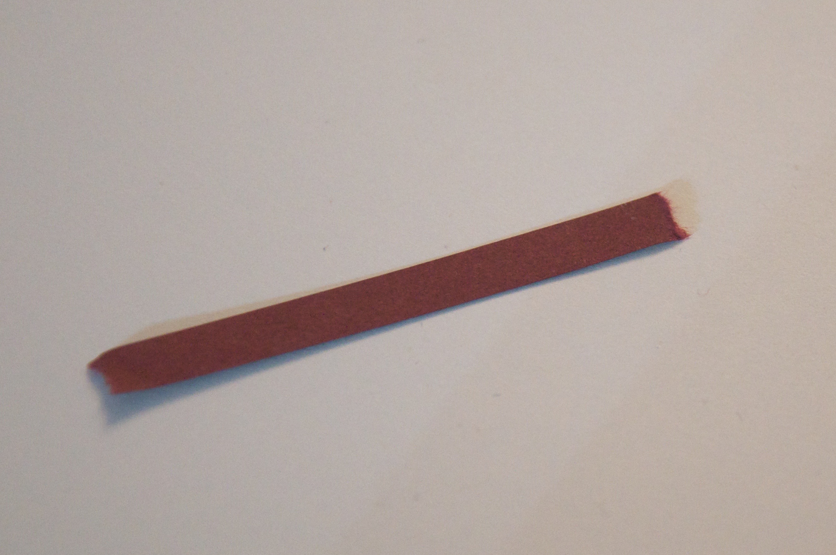 Image of ripped quilling paper