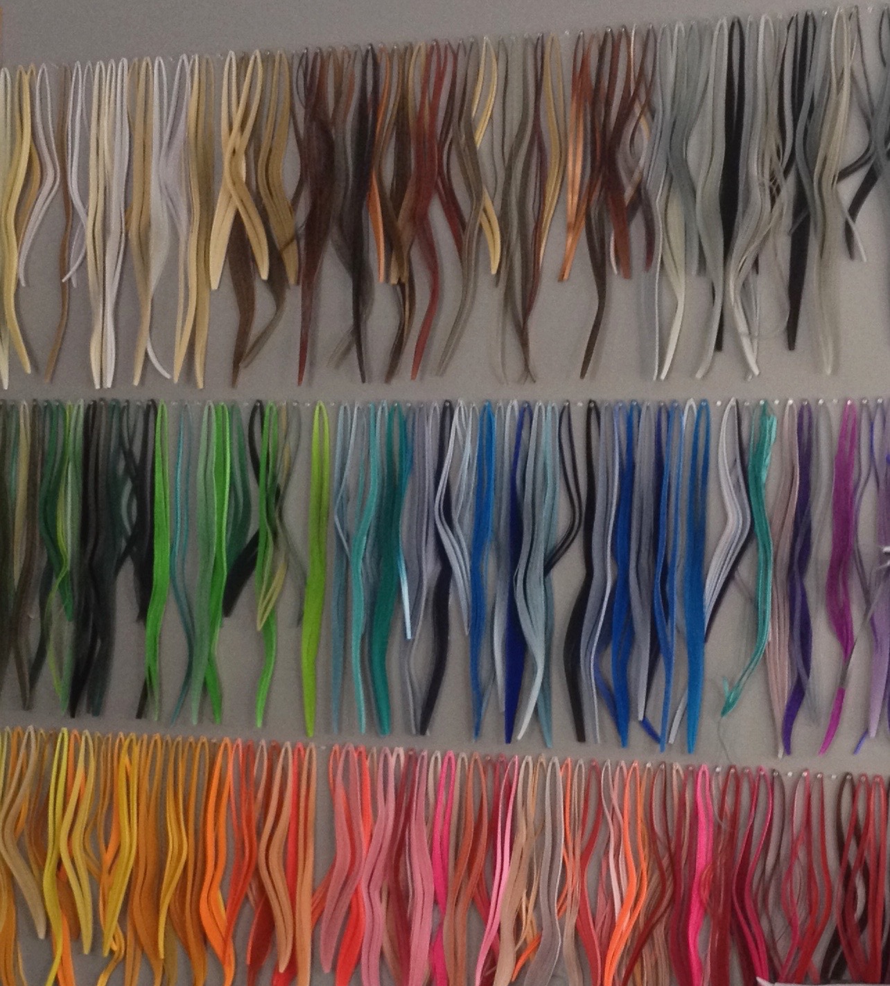 Image of a wall of stored quilling paper