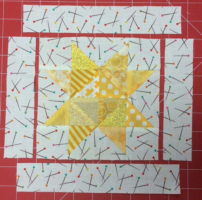 Sew the borders onto the block