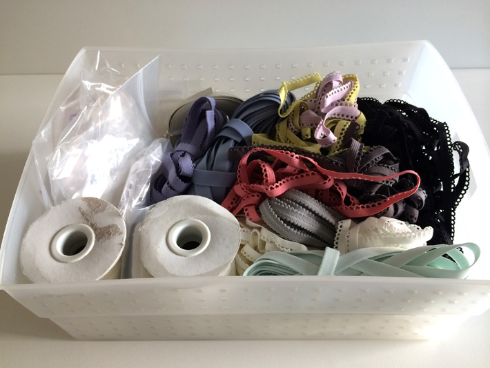 Lingerie elastic stored in a bin