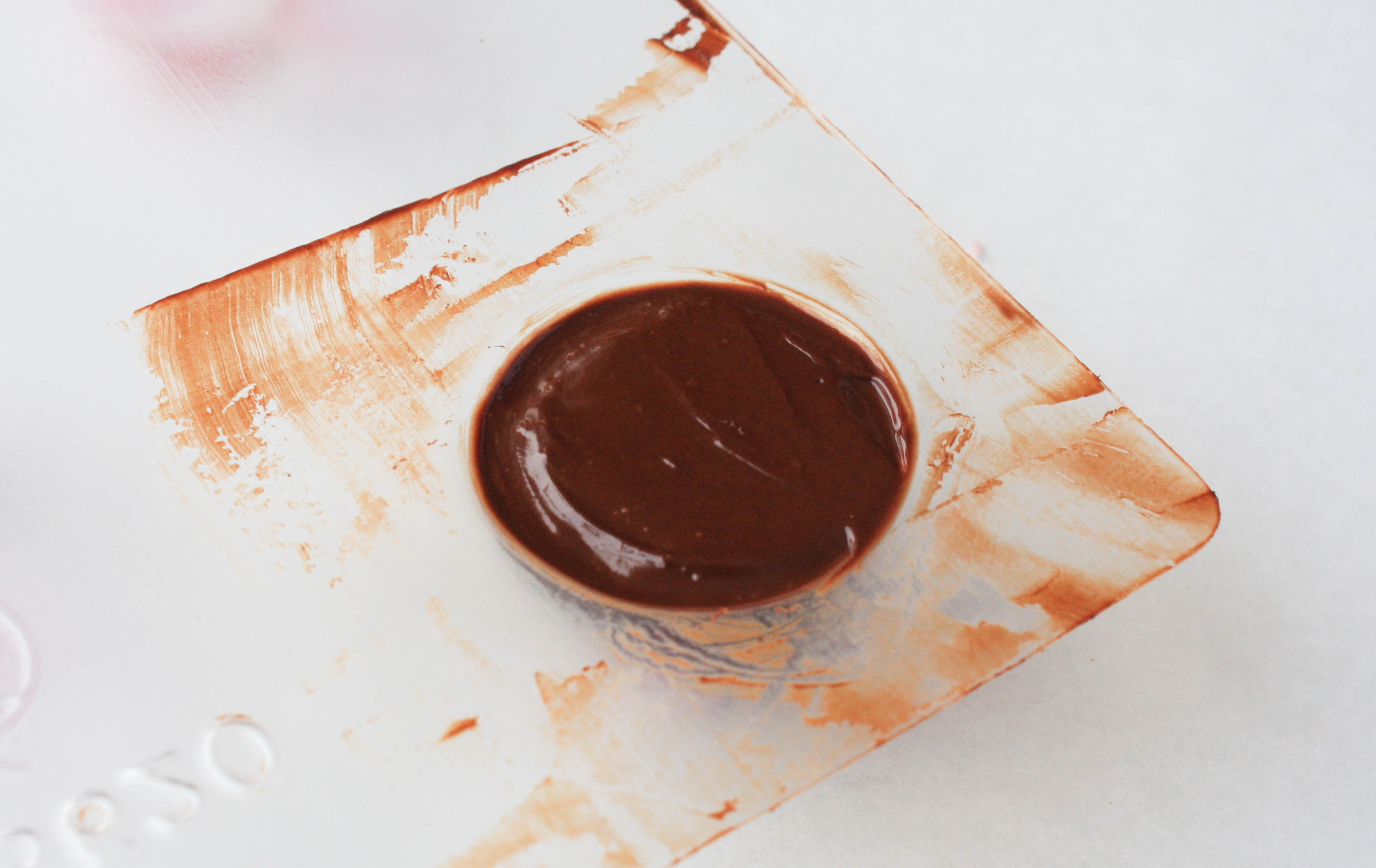 Filling in the Chocolate Mold | Erin Gardner