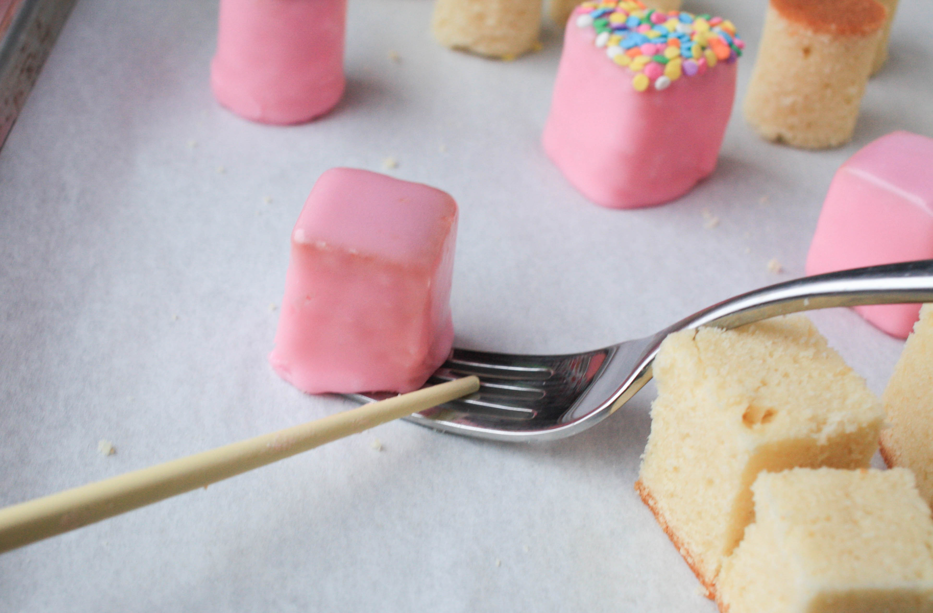 Dipped Petit Four Drying on a Sheet