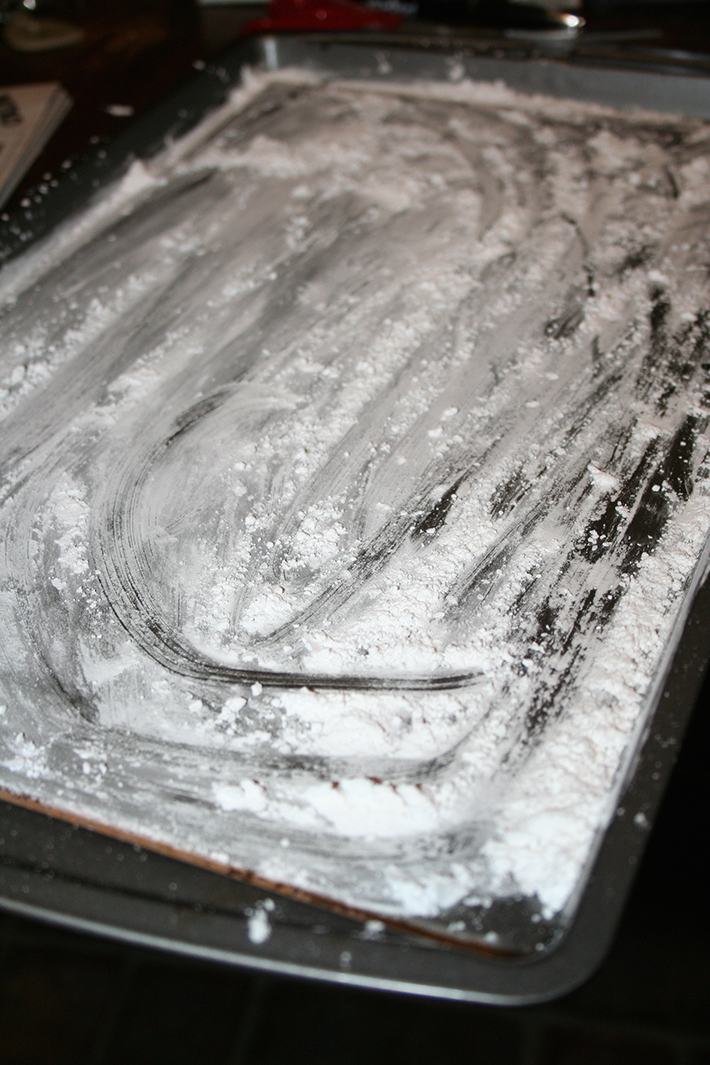 Dust a baking pan with confectioners' sugar