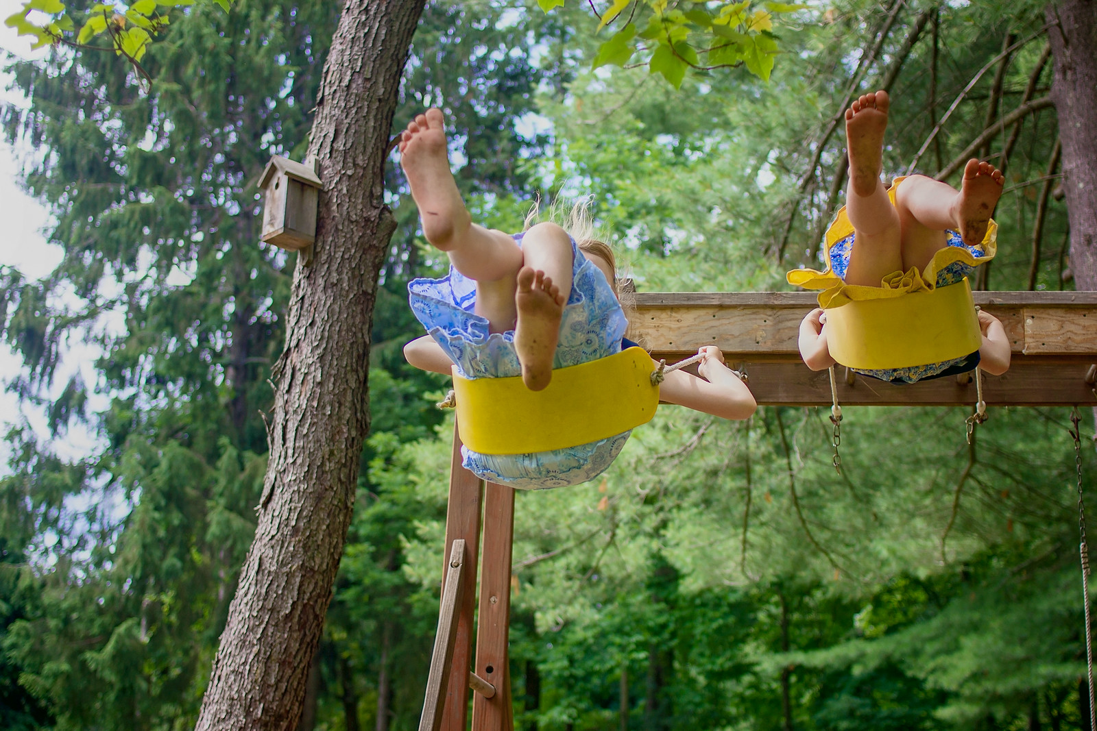 girls on swings, legs, summer