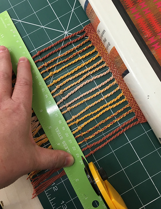 trimming end of scarf fringe