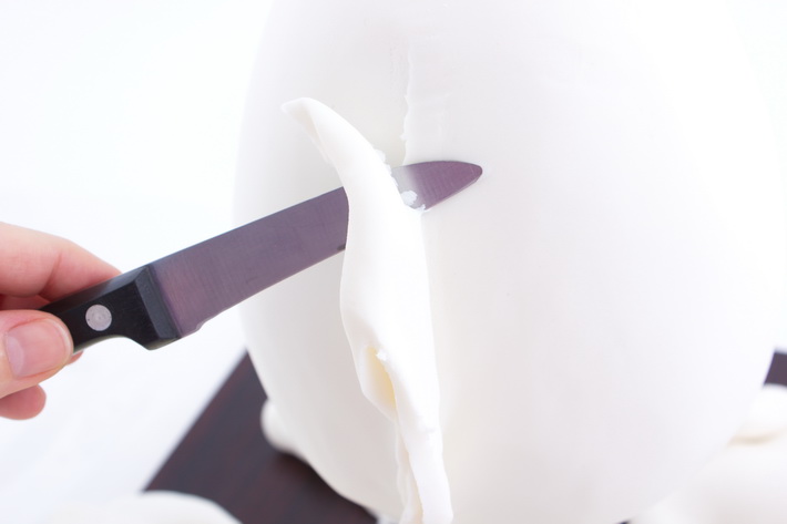 Cut excess fondant