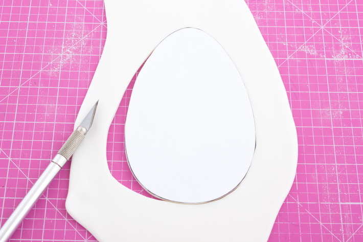 Cut out egg shaped plaque
