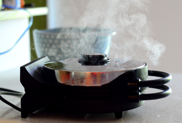 A Belgian Waffle Iron at Work