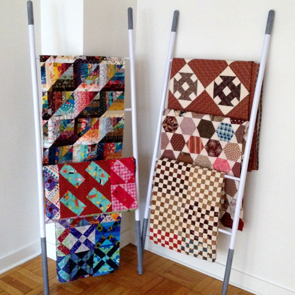 Quilts Displayed on Ladders