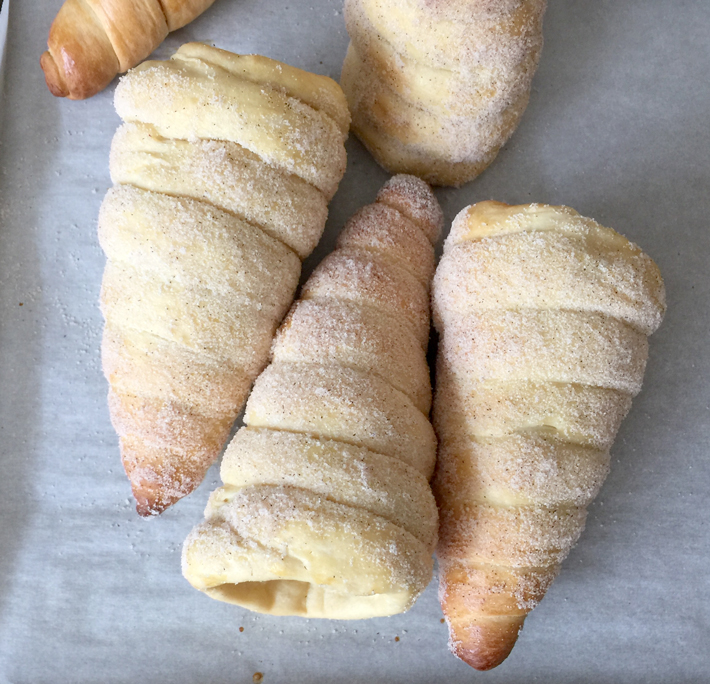 donut ice cream cones dusted with cinnamon and sugar