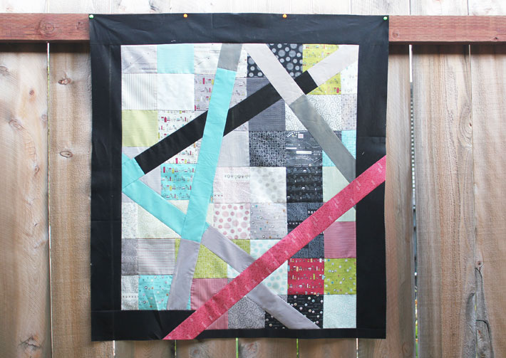 finished quilt using charm squares