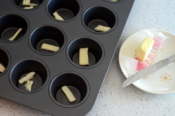 Buttering a Muffin Pan for Pancake Cups